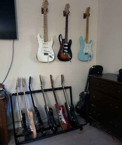 guitars rack wall too many